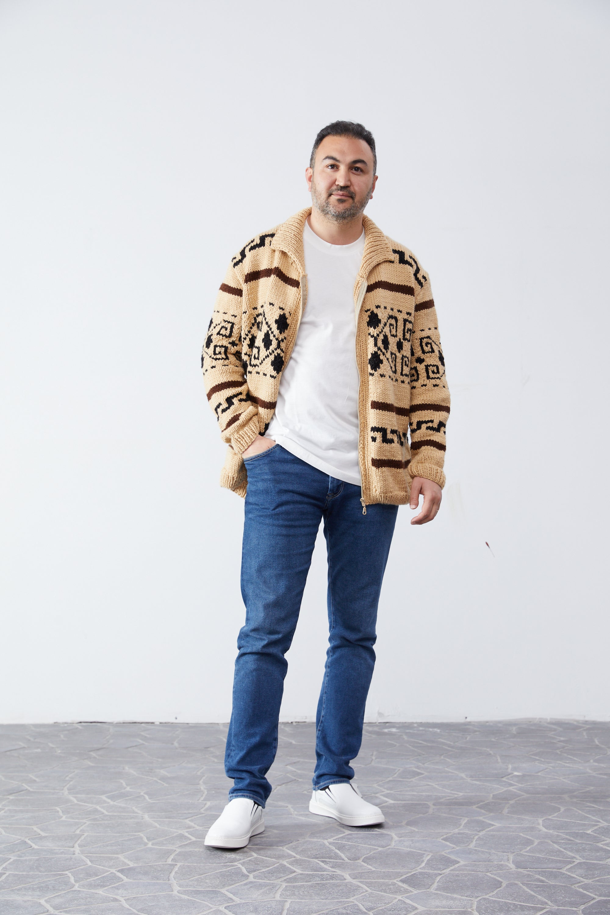 Big Lebowski Dude Cardigan — hand-knit cream wool zip sweater worn by model
