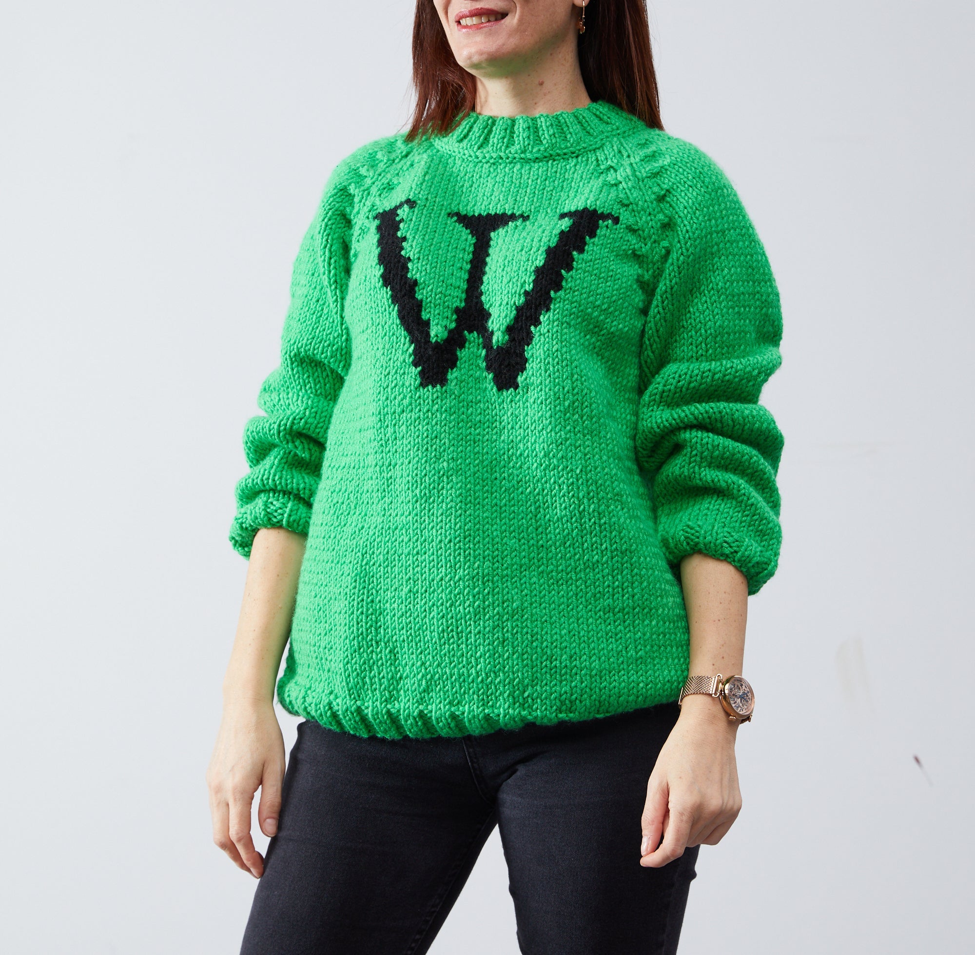 Green Monogram Weasley jumper with black W letter — hand-knit wool