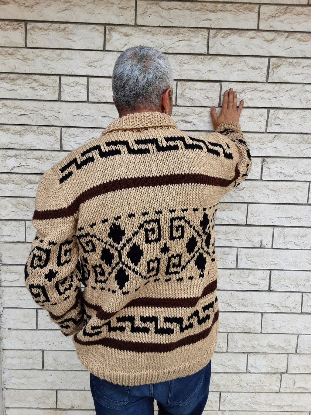 Beige knit sweater with high collar