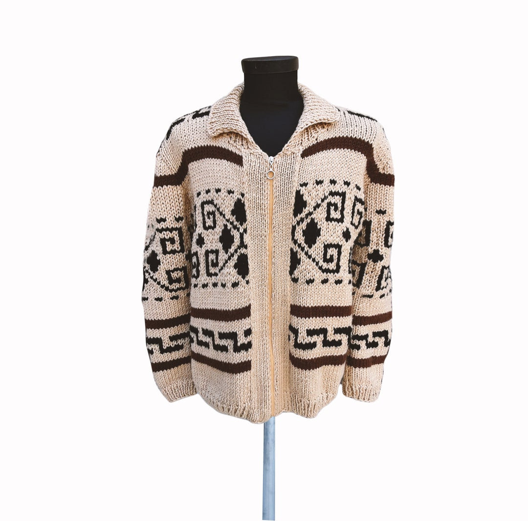 Beige hand-knit cardigan with brown and black geometric pattern and long sleeves
