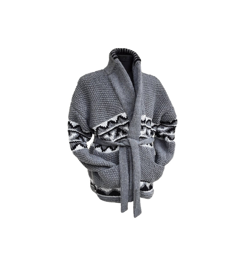 Grey chunky knit cardigan with black and white geometric pattern, shawl collar and tie belt