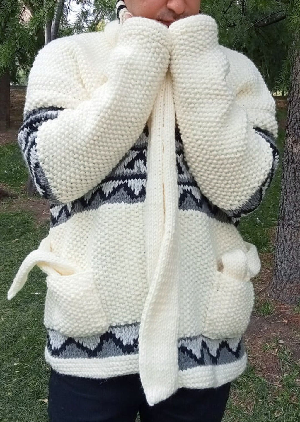 Cream cardigan with shawl collar and tie belt hanging down
