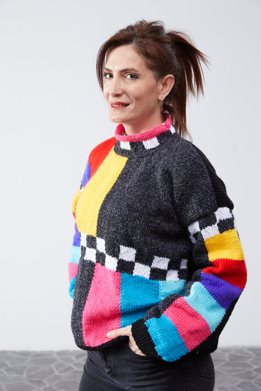 No Signal TV sweater front close-up with mock neck and color bars