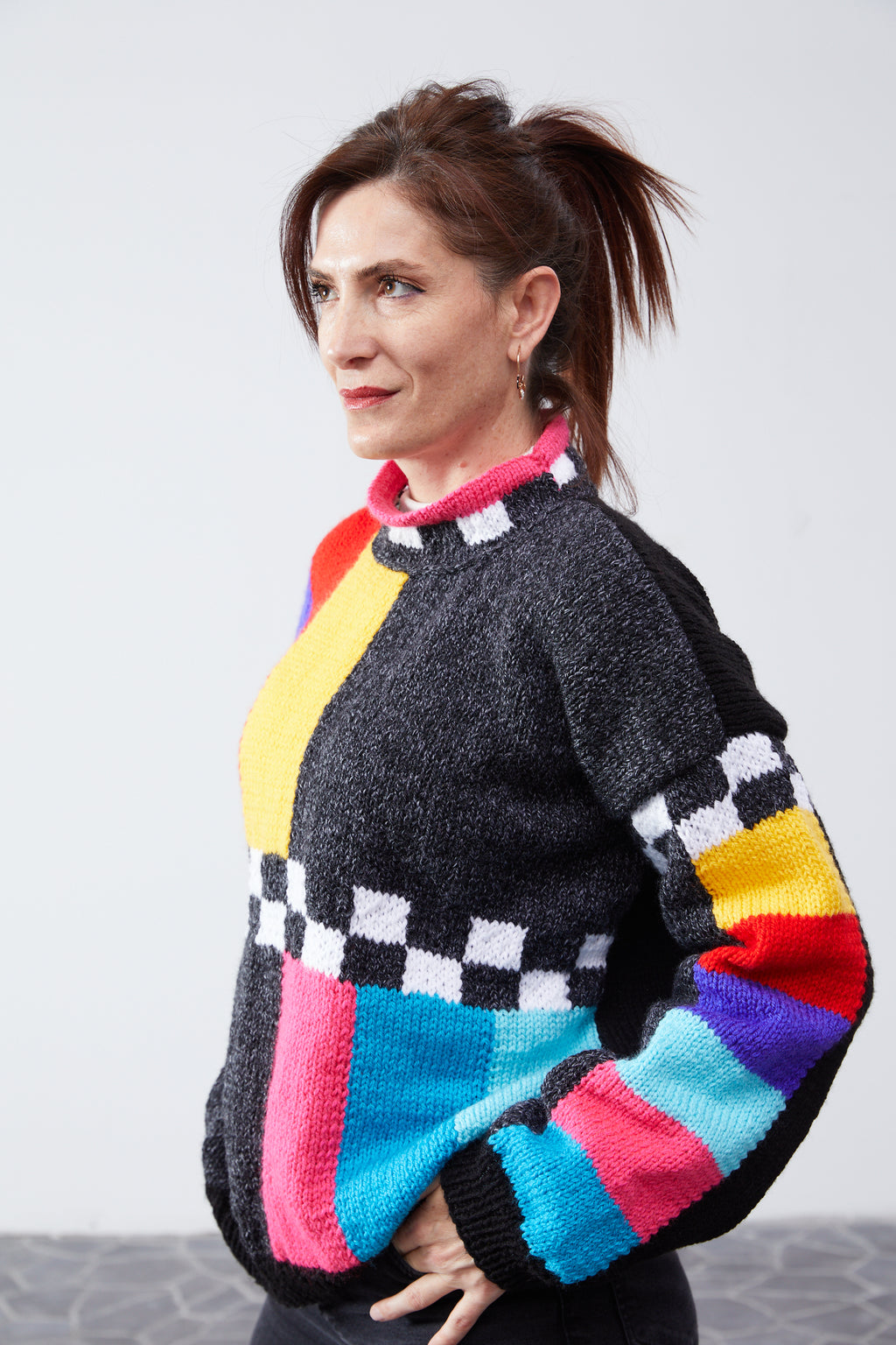 No Signal TV sweater side view showing the colorblocked sleeve